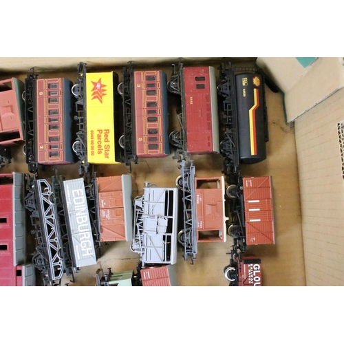 111 - Around 80 OO gauge items of rolling stock to include mainly Triang & Hornby examples featuring wagon... 