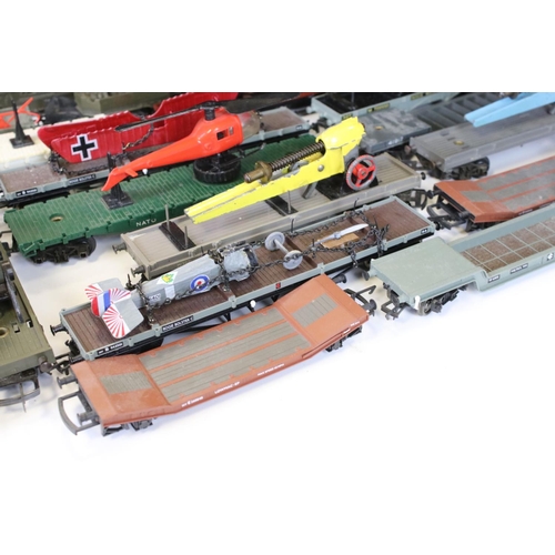 112 - Around 23 OO gauge Triang & Hornby items of rolling stock to include many Battle Space examples