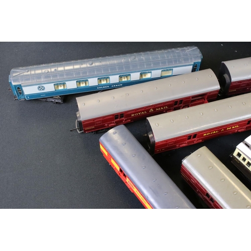 124 - 48 OO gauge items of rolling stock to include Royal Mail coaches and passenger coaches etc featuring... 