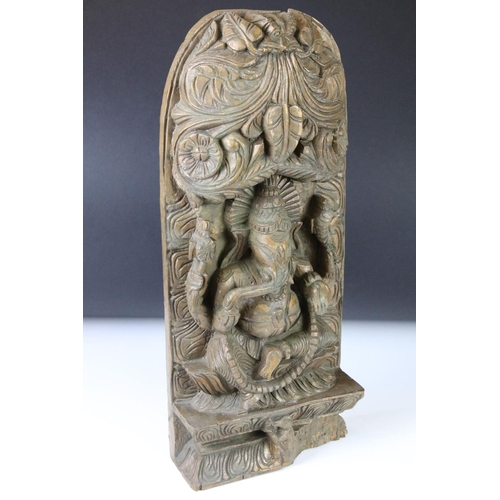 101 - Indian Hindu carved wooden wall plaque depicting Ganesh, gilt finish, approx 45cm high