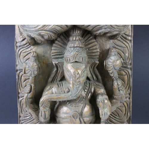 101 - Indian Hindu carved wooden wall plaque depicting Ganesh, gilt finish, approx 45cm high