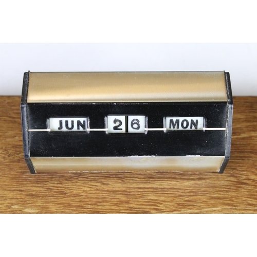 108 - Mid century Desk Stand comprising perpetual calendar and two pens holders, mounted on a wooden plint... 