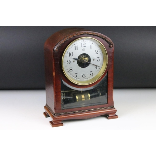 110 - Early 20th century Bulle mahogany cased electric mantel clock, the silvered dial set with Arabic num... 