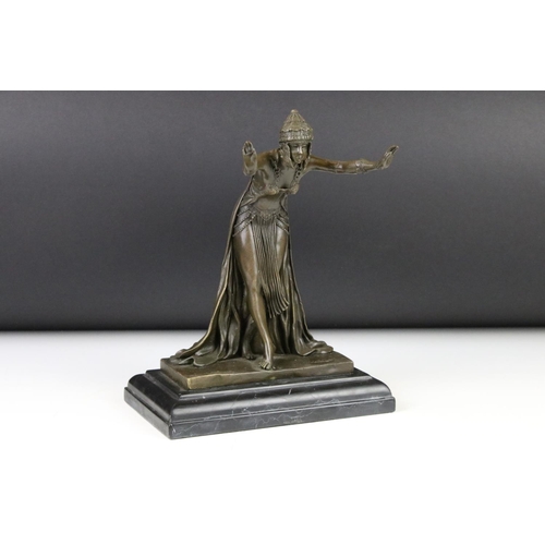 111 - A bronze art deco style figure signed standing on stepped marble base, 25.5cm high