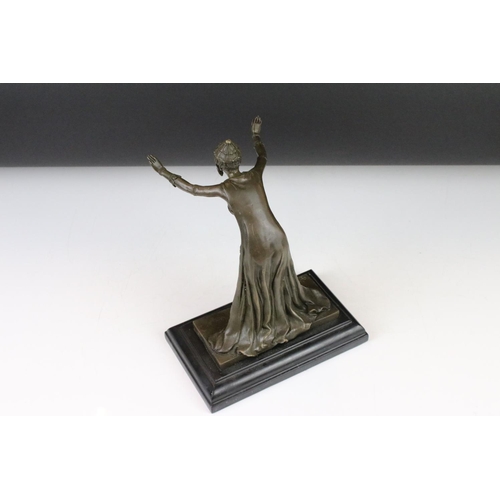 111 - A bronze art deco style figure signed standing on stepped marble base, 25.5cm high