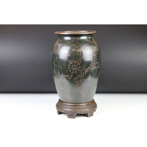 116 - WMF patinated metal ovoid vase with engraved dragon decoration, stamped mark to base, 30cm high, rai... 