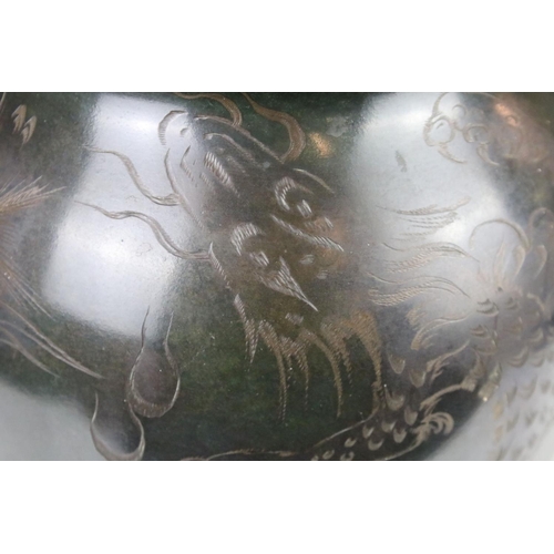 116 - WMF patinated metal ovoid vase with engraved dragon decoration, stamped mark to base, 30cm high, rai... 