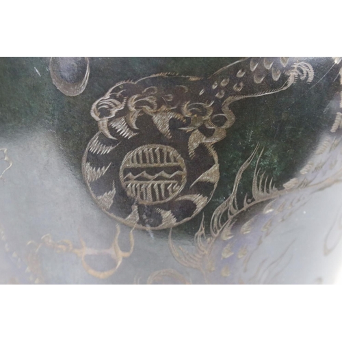 116 - WMF patinated metal ovoid vase with engraved dragon decoration, stamped mark to base, 30cm high, rai... 