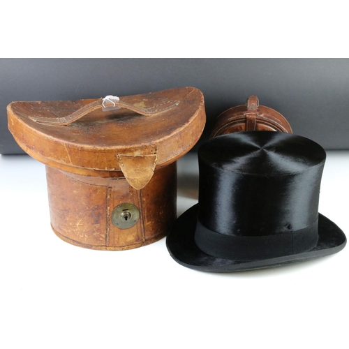 180 - Herbert Johnson, New Bond Street, black moleskin top hat, in leather case with carrying handle and l... 