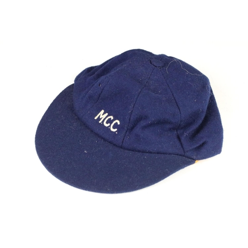 182 - Two sporting caps, possibly cricket, comprising: Bukta Sportswear in blue, monogrammed MCC (possibly... 