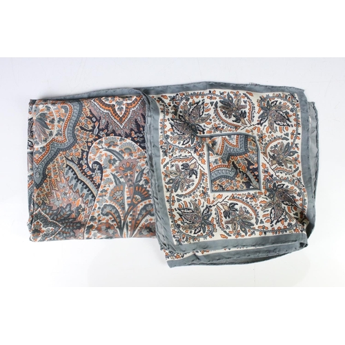 196 - Liberty of London Silk Scarf decorated with a paisley pattern, 87cm x 87cm