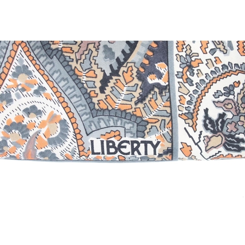 196 - Liberty of London Silk Scarf decorated with a paisley pattern, 87cm x 87cm