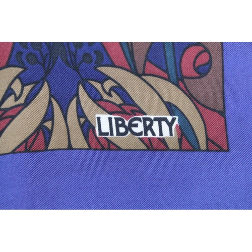 197 - Liberty of London Scarf decorated with stylised flowers within a blue border 56cm x 56cm together wi... 