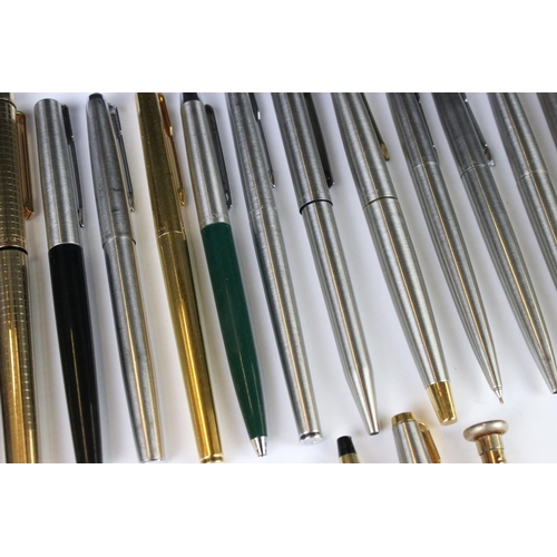 202 - A large collection of pens to include many Parker examples.