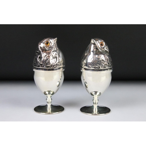 203 - A pair of silver plated chick style egg cups.