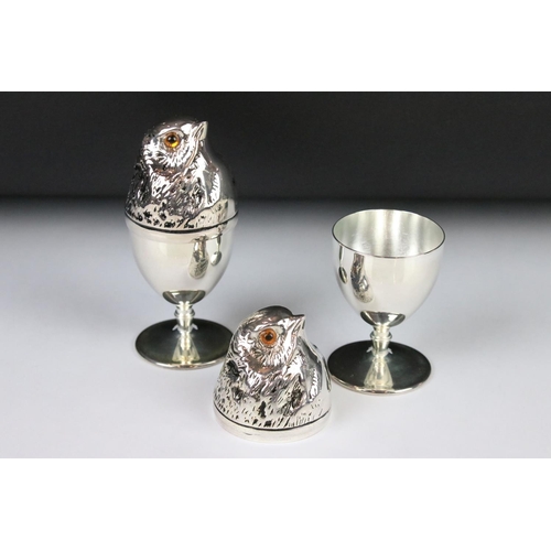 203 - A pair of silver plated chick style egg cups.