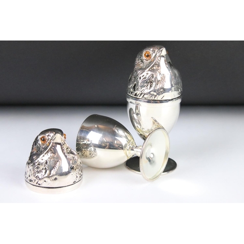 203 - A pair of silver plated chick style egg cups.