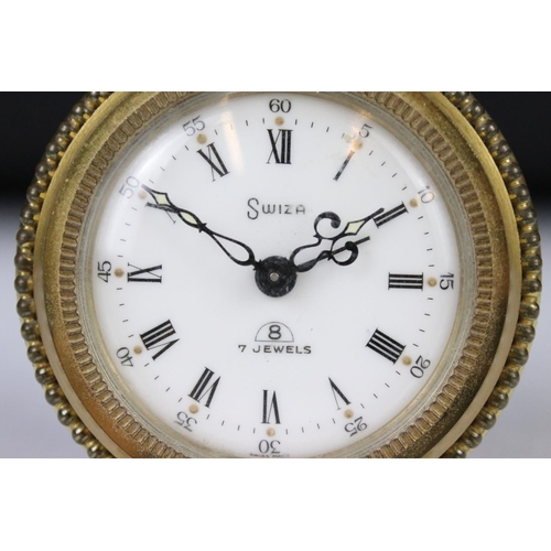 204 - A vintage Swiza 7 Jewel, 8 day travel alarm clock.