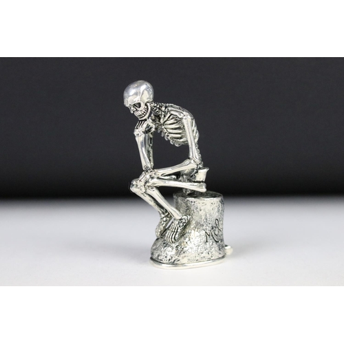 209 - An unusual seated skeleton vesta case.