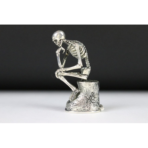 209 - An unusual seated skeleton vesta case.