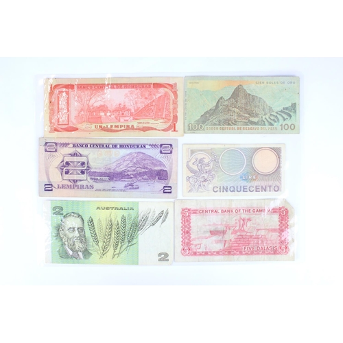 265 - A collection of mixed British and foreign banknotes.