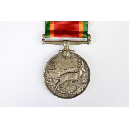 266 - A pair of World War Two full size medals to a female recipient to include the 1939-45 British war me... 