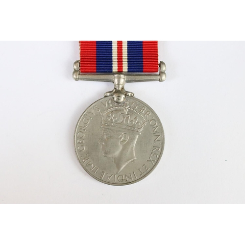 266 - A pair of World War Two full size medals to a female recipient to include the 1939-45 British war me... 