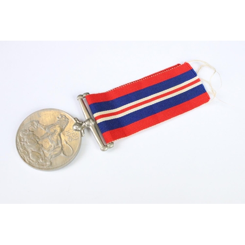 266 - A pair of World War Two full size medals to a female recipient to include the 1939-45 British war me... 