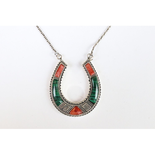 267 - A silver horseshoe shaped necklace set with malachite and agate.