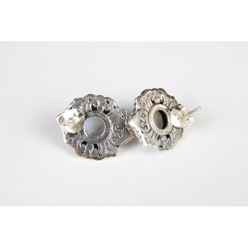 270 - A pair of silver moonstone stud earrings.