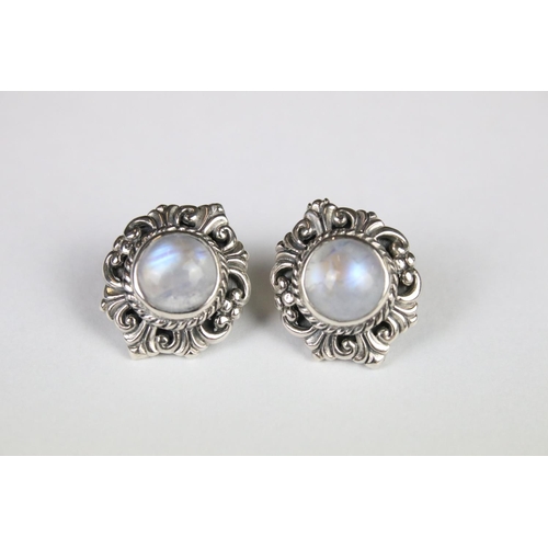 270 - A pair of silver moonstone stud earrings.