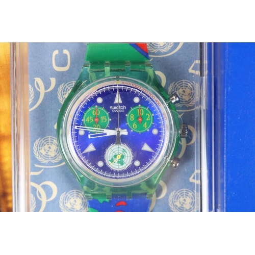 271 - Four swatch watches including limited edition Irony Diaphane Chronograph, Boxed 50th anniversary of ... 