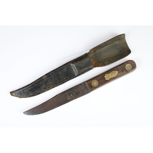 273 - Two Green River Company knives, a Bushman knife and another knife, all complete with leather sheaths