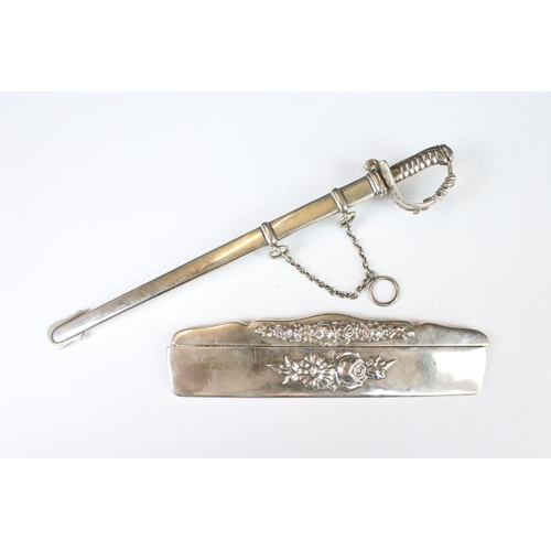 277 - A fully hallmarked sterling silver letter opener in the form of a sword with scabbard together with ... 