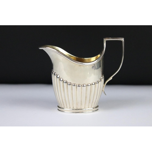 278 - A fully hallmarked sterling silver cream jug, assay marked for London.