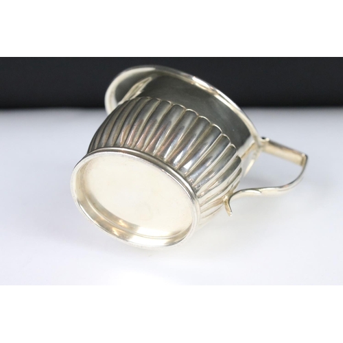 278 - A fully hallmarked sterling silver cream jug, assay marked for London.