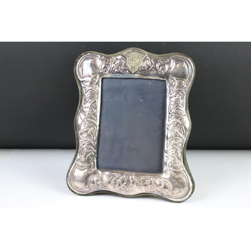 281 - A sterling silver photograph frame with decorative Celtic design, marked with the Dublin crest.