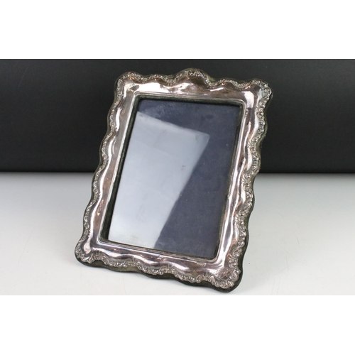 283 - A fully hallmarked sterling silver photograph frame, maker marked KFLd and assay marked for London.