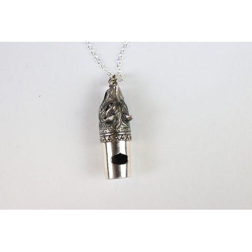 291 - A silver dog figural whistle on chain.