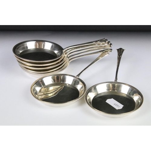 292 - A pair of silver plated knife rests together with a set of six Mappin & Webb condiment pans and a hi... 