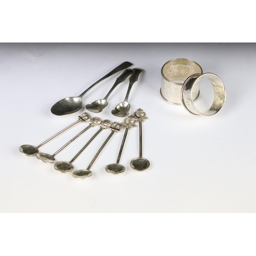 294 - A small collection of hallmarked silver to include spoons and napkin ring together with a silver pla... 