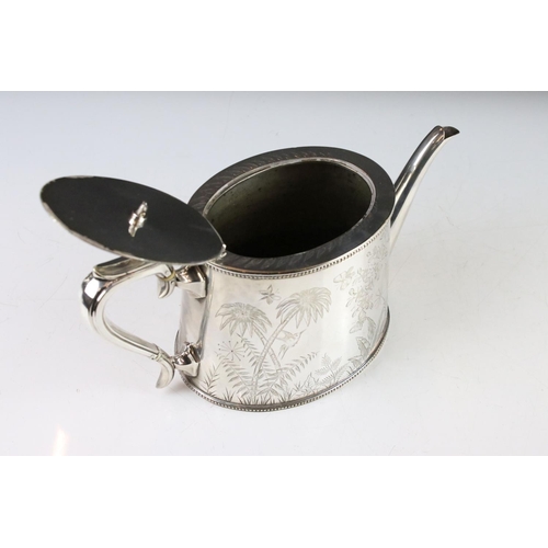 299 - An antique silver plated tea set to include teapot, water jug, cream jug and sugar bowl, all with fl... 