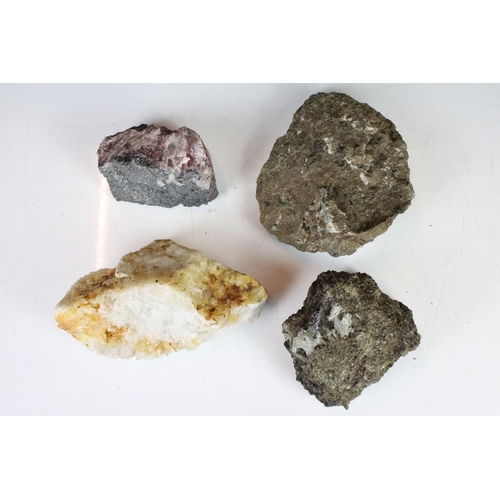 306 - A large collection of mineral specimens to include Quartz, Valentine, Perovskite, Fluorite...etc..