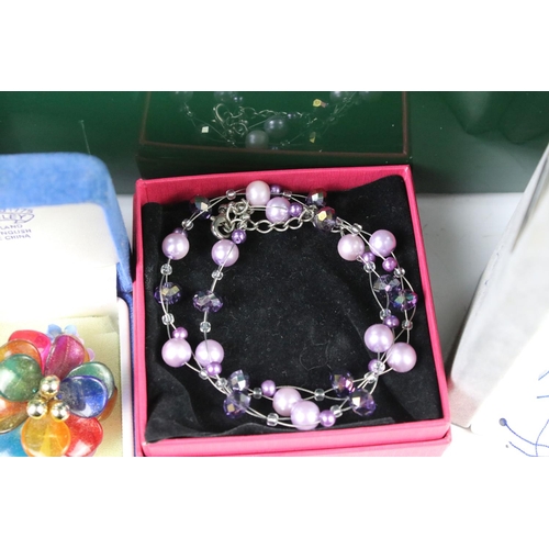 310 - A large collection of mainly contemporary costume jewellery to include necklaces, bracelets, watches... 