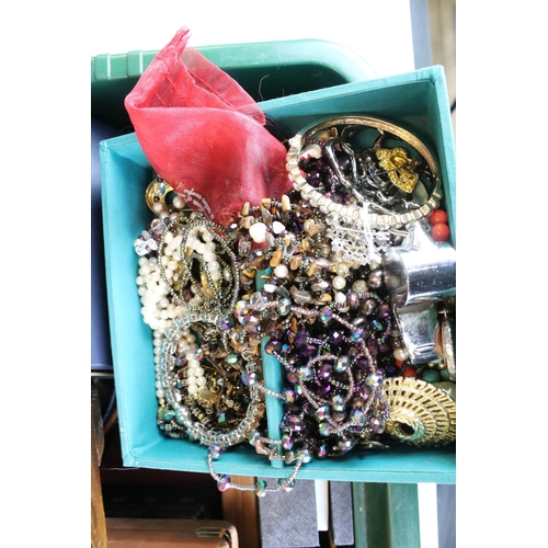 310 - A large collection of mainly contemporary costume jewellery to include necklaces, bracelets, watches... 