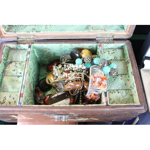 310 - A large collection of mainly contemporary costume jewellery to include necklaces, bracelets, watches... 