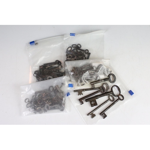344 - A large collection of vintage keys of various styles and sizes.