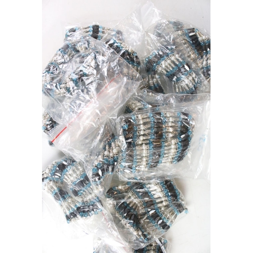 352 - A collection of Light blue six strand bracelets with magnetic fixings.