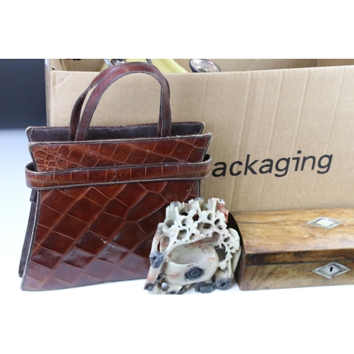 382 - A box of mixed collectables to include a wooden writing slope, candlestick, silver-plated serving se... 