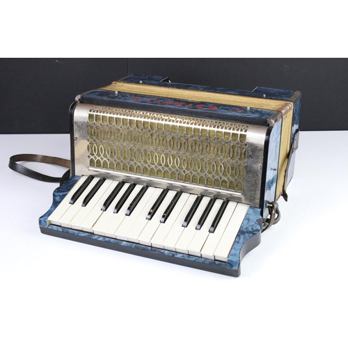 398 - A vintage Estrella piano accordion complete with instruction book and original case.
